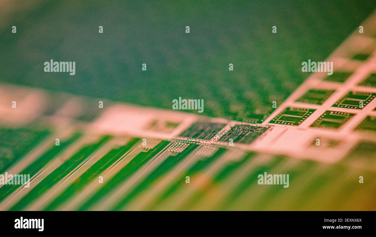 Wafer showing microchips and electronic circuits essential for technology Stock Photo