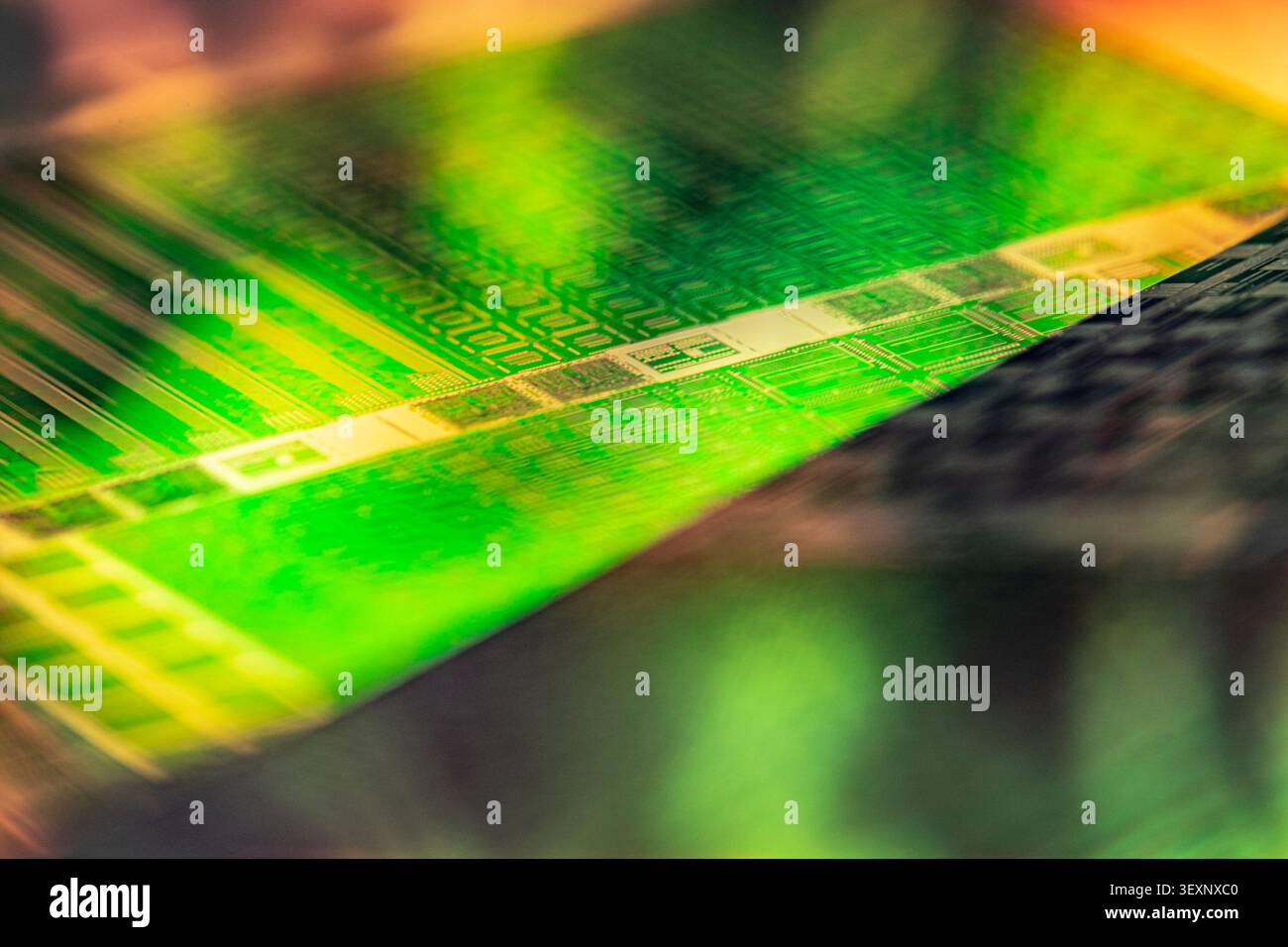 Silicon wafer showcasing intricate microchip circuitry and technology Stock Photo