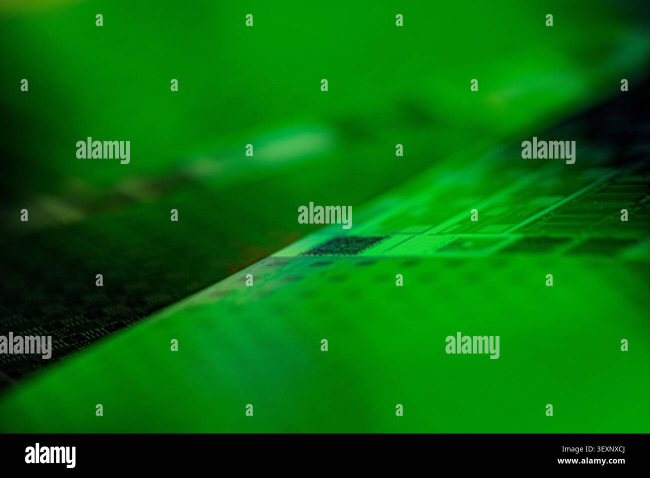 Wafer surface displaying microchip patterns and semiconductor technology Stock Photo
