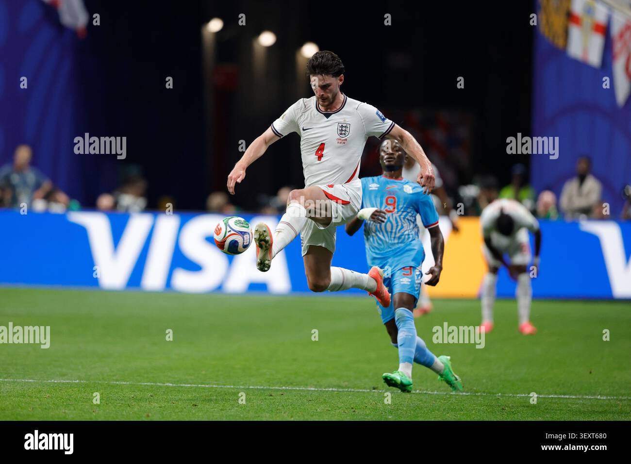 England's Declan Rice (4) jumps for the ball with ahead of Congo's ...