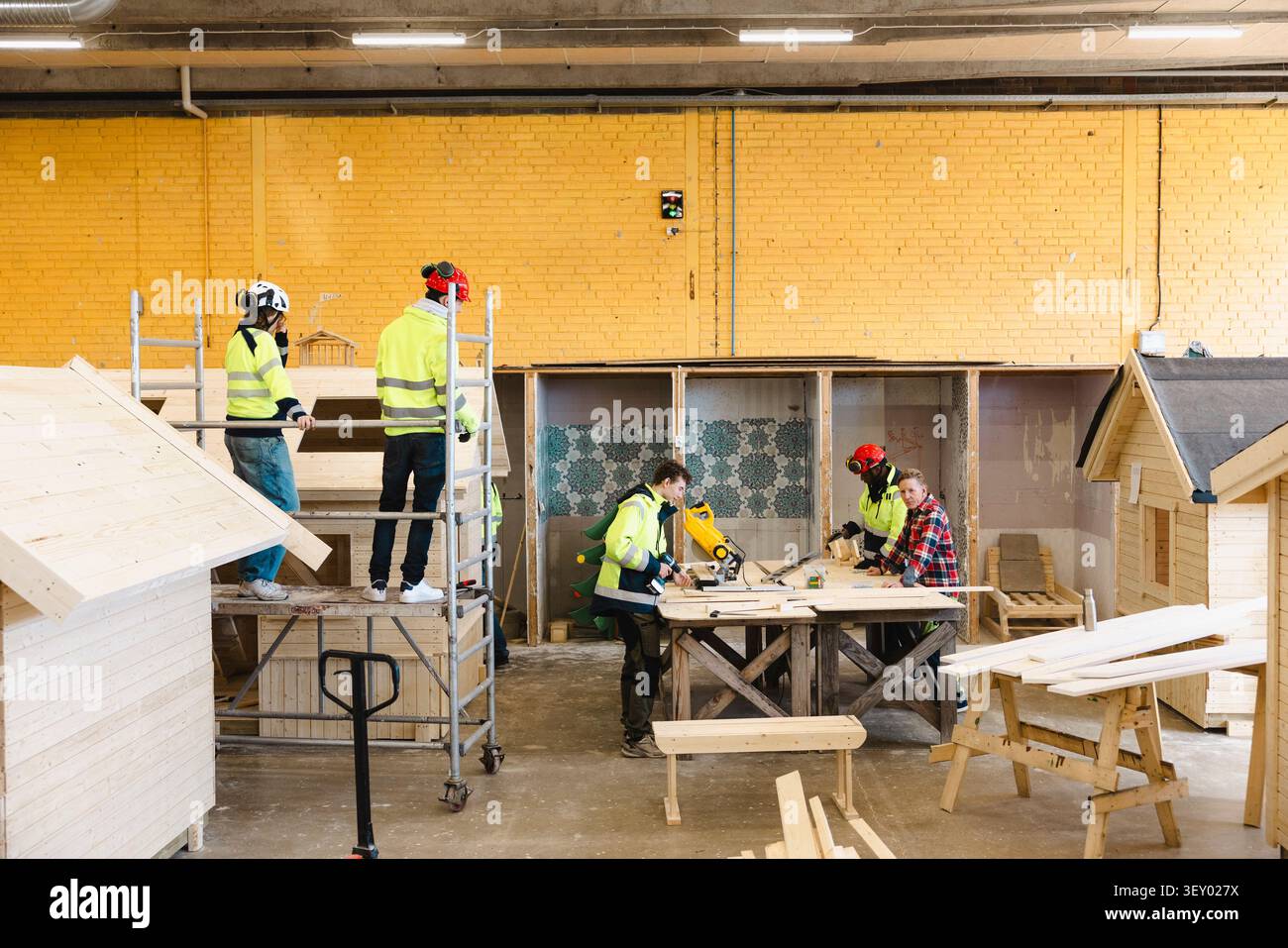 Vocational students doing carpentry tasks in workshop at upper secondary school Stock Photo