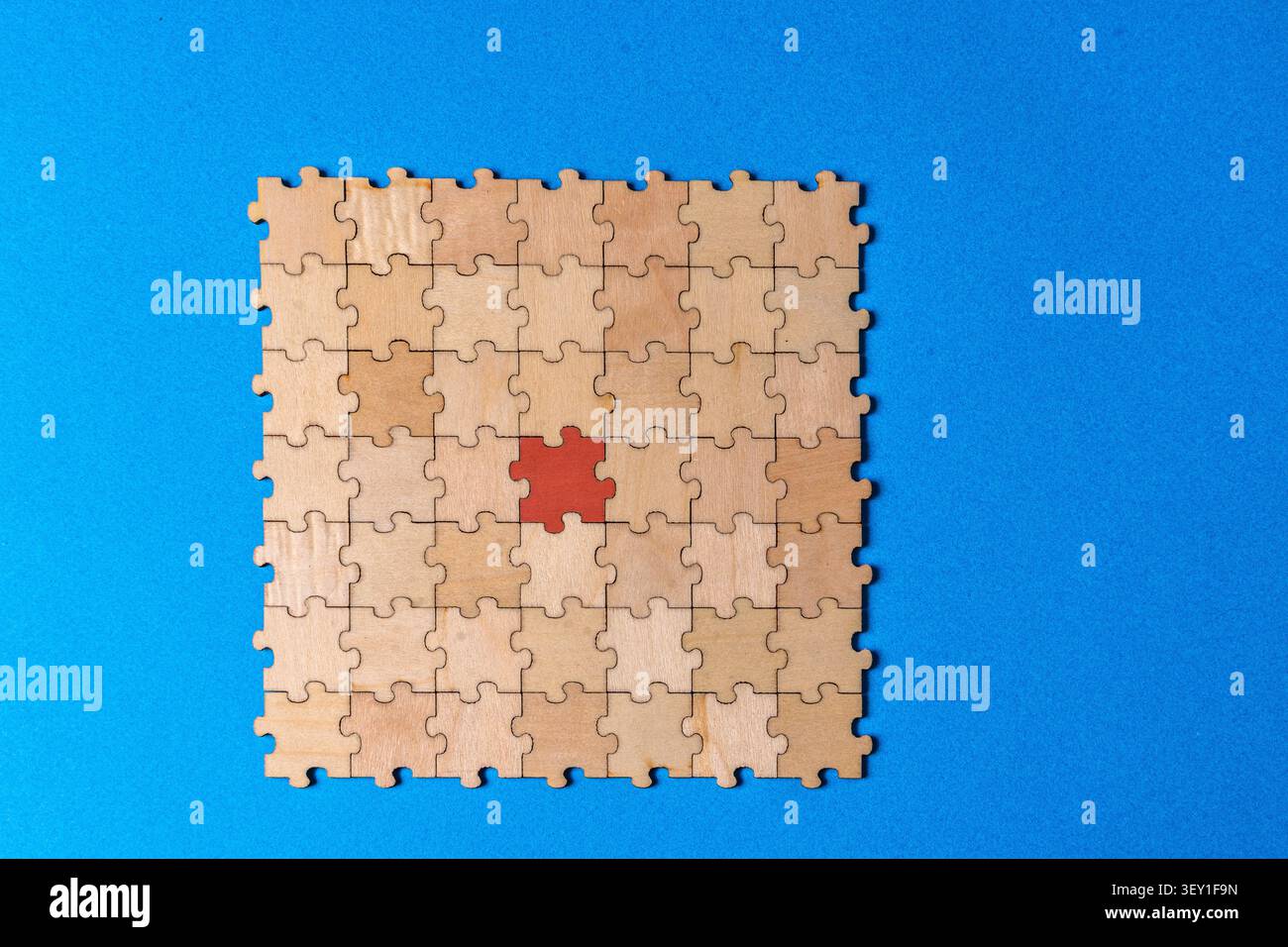 Forming a team solution with diverse puzzle pieces Stock Photo