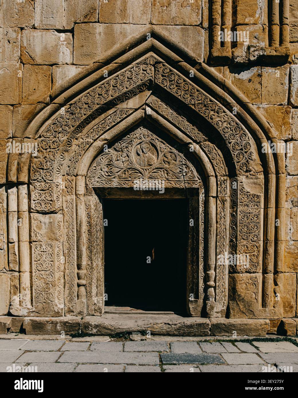 Intricately carved stone doorway of Ananuri church in Georgia. Stock Photo