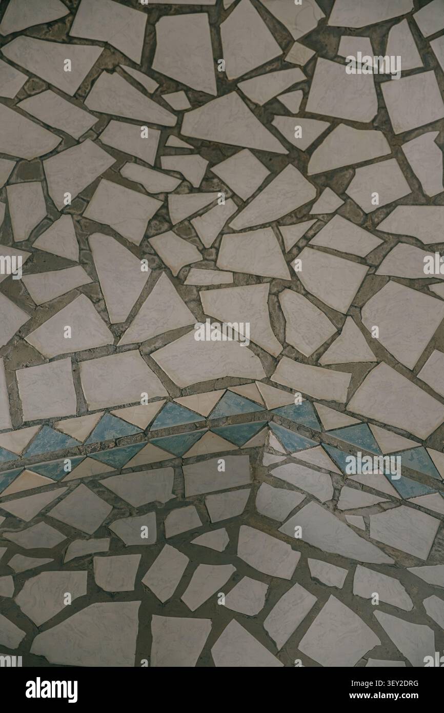 Abstract mosaic stone floor texture with geometric tile patterns. Stock Photo