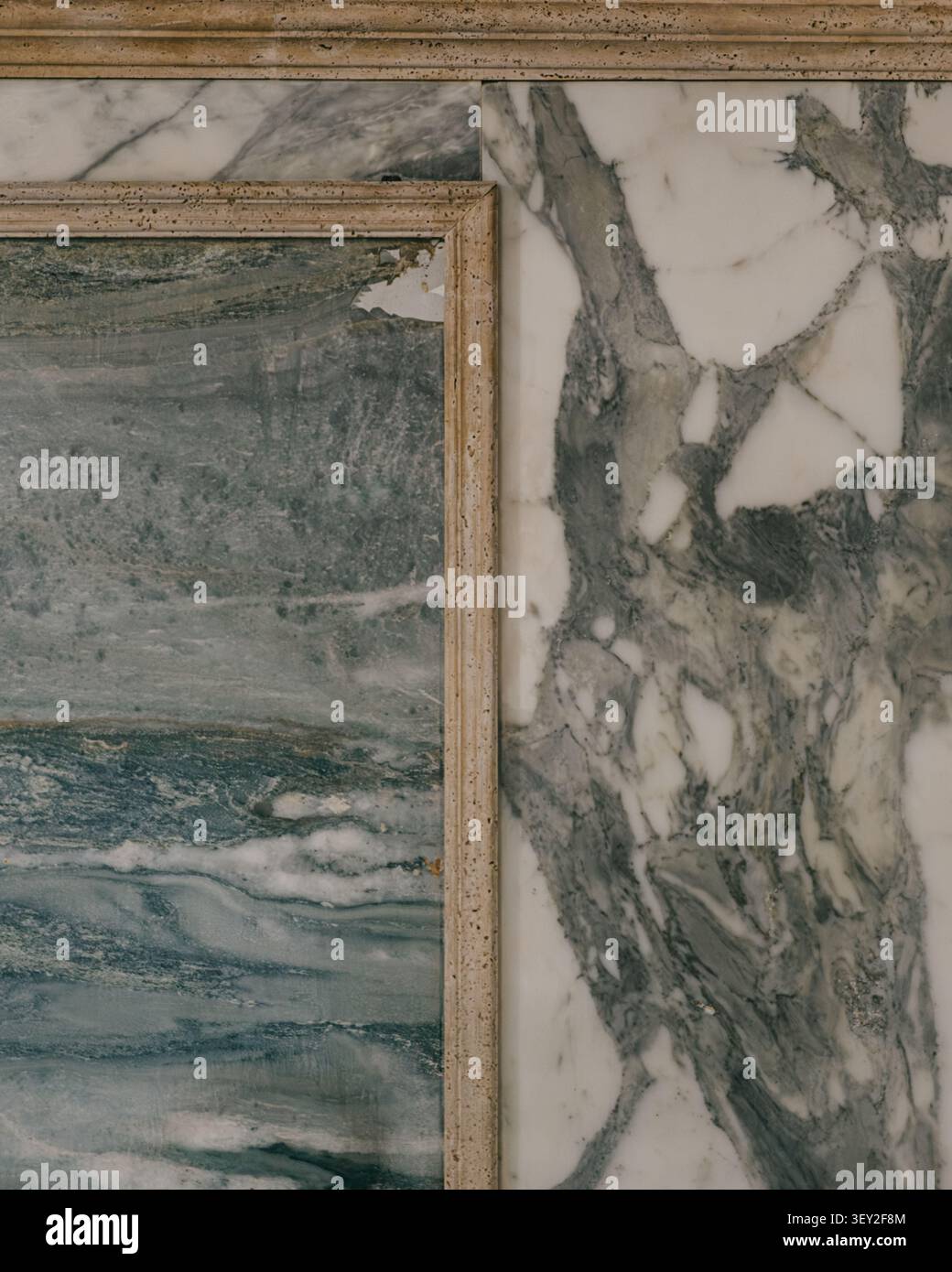 Elegant marble wall texture with framed stone panel details. Stock Photo