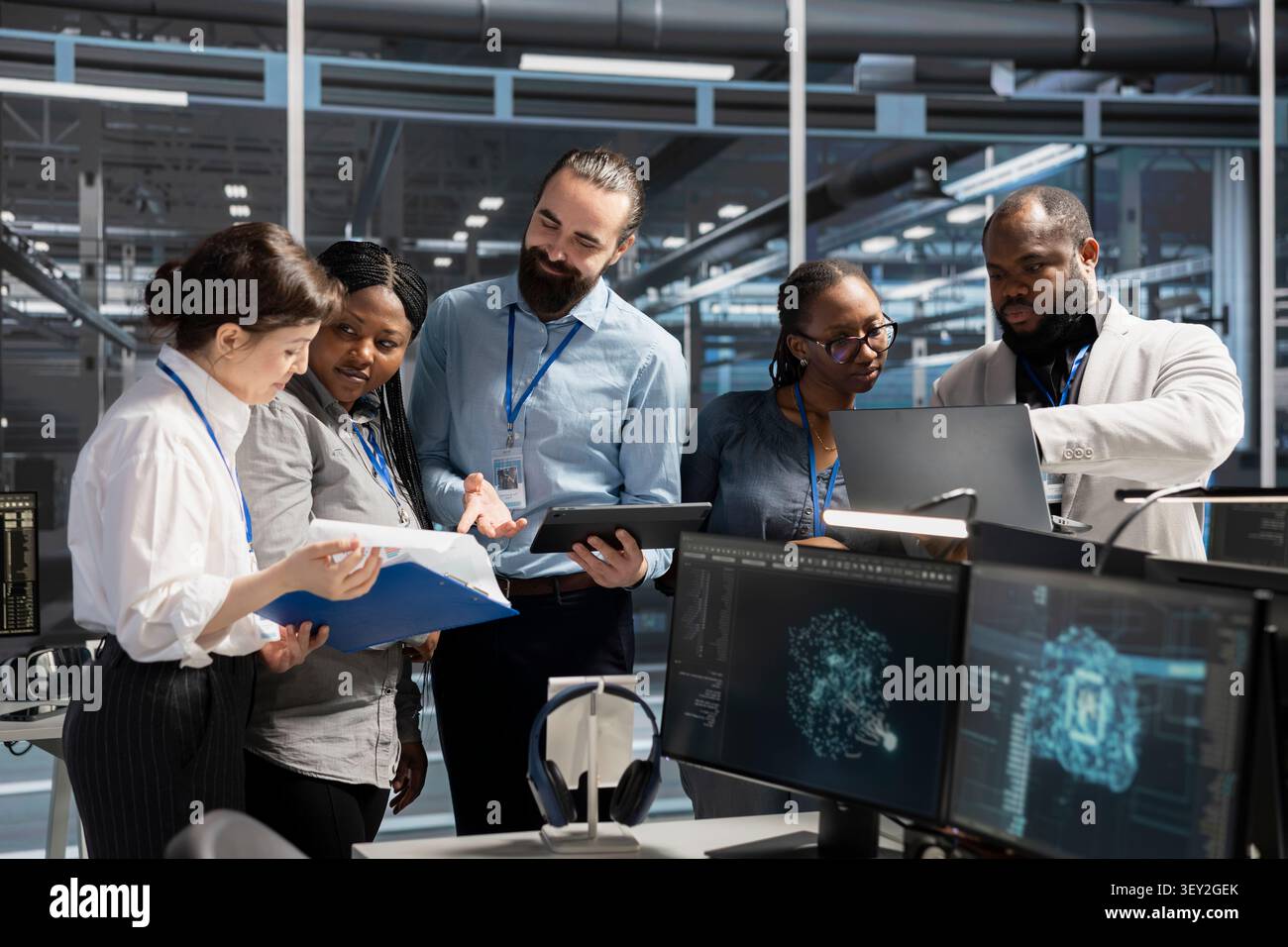 Engineering team collaborating in high tech server room with AI neural network systems tech, while staff members collaborating, working with AI programming language to update equipment. Stock Photo