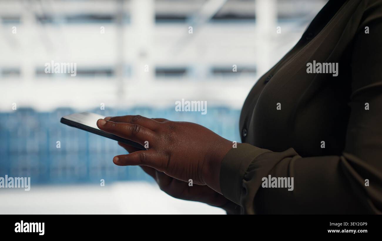 IT colleagues collaborate in a data center while reviewing AI diagnostics and infrastructure performance. Stock Photo
