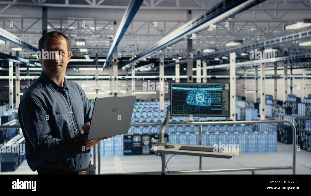 Technical specialist in computing facility checks AI dashboard working with notebook during routine systems check, while tests AI tools on notebook to confirm reliable operational performance. Stock Photo