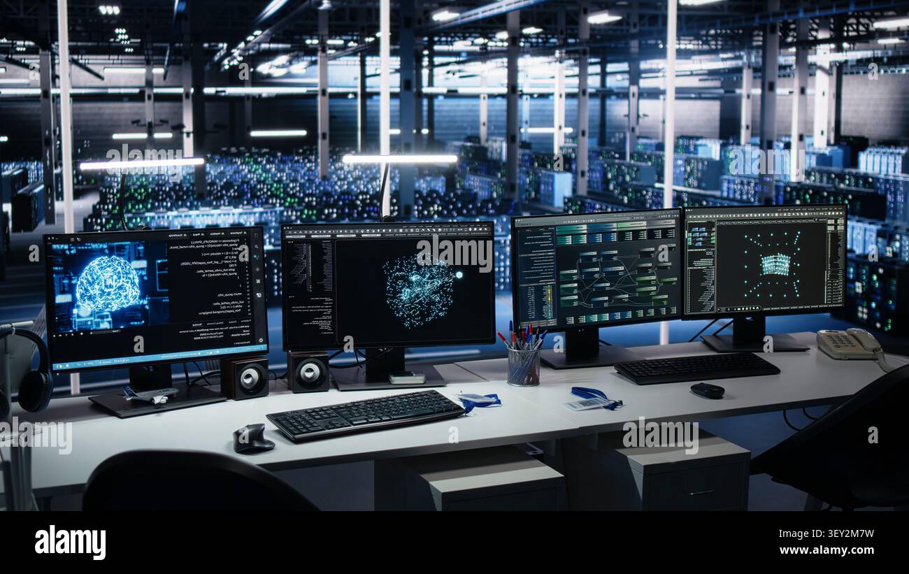 IT specialist reviews neural network visualization on computer screens in a server room during software debugging work. Stock Photo