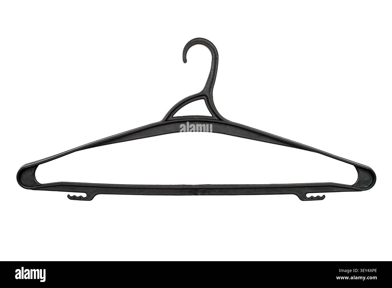 Modern plastic clothes hanger on white background. Black clothes hanger isolated. Stock Photo