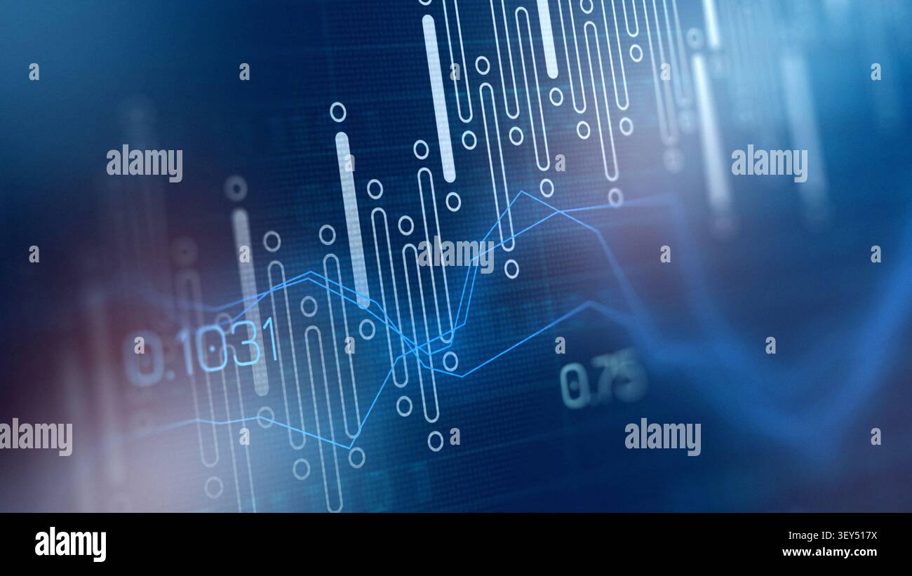 Traders analyze market data using charts and graphs in a financial setting Stock Photo