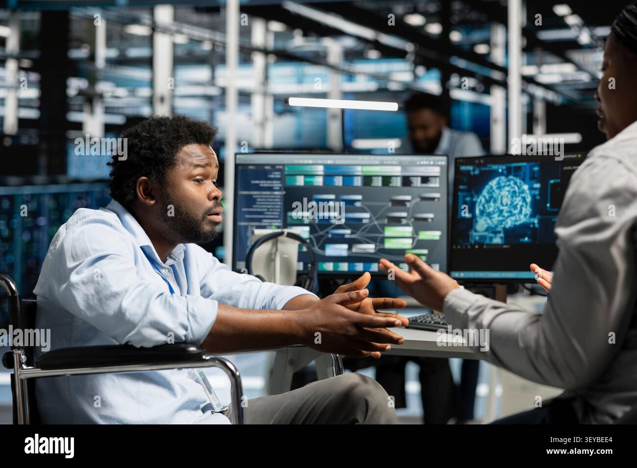 Engineer with disability and manager inspect a neural network data center, optimizing an inclusive server hub for AI workloads. Stock Photo