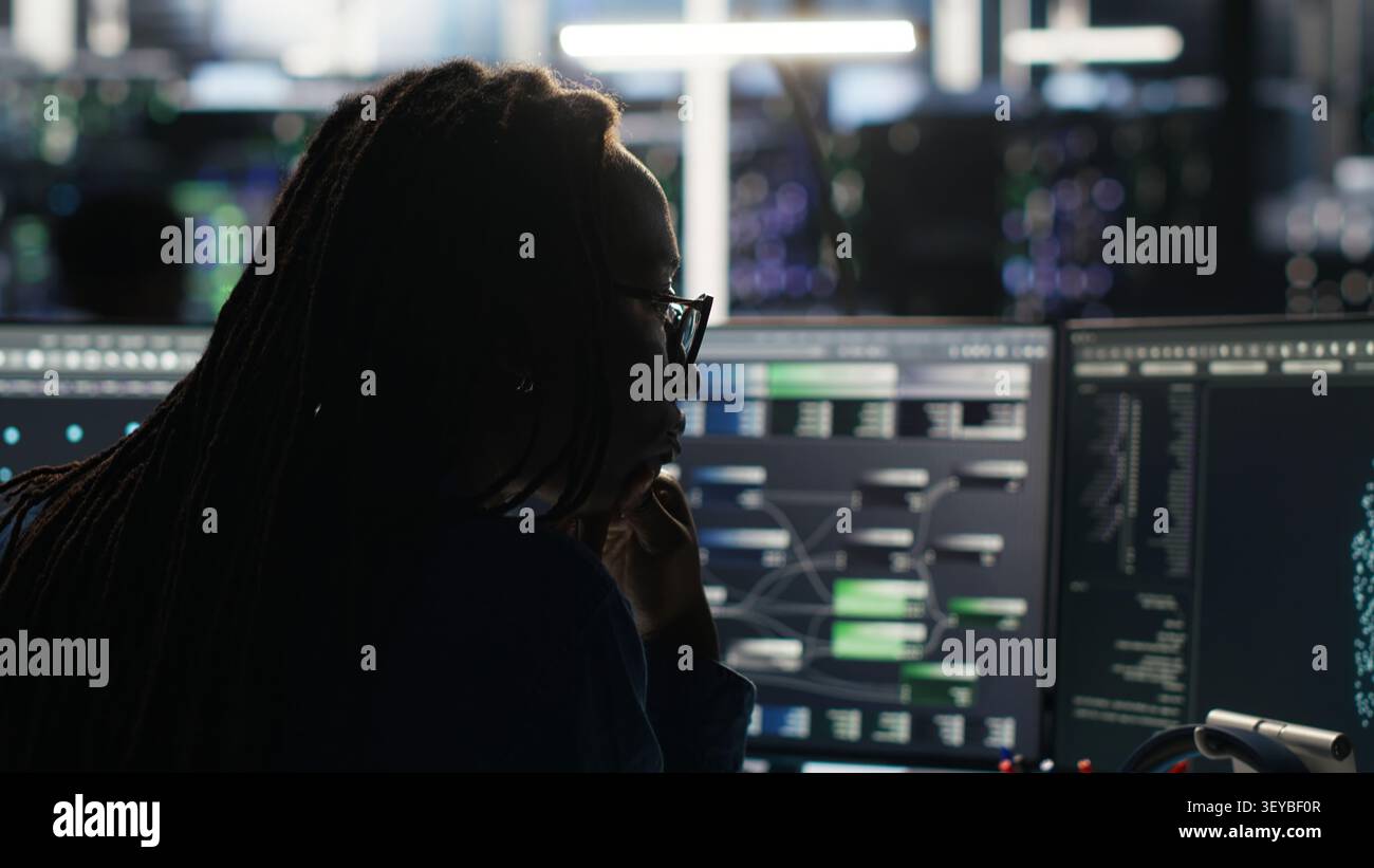 Computer scientist reviews node tree software to analyze datasets and improve server infrastructure performance. Stock Photo