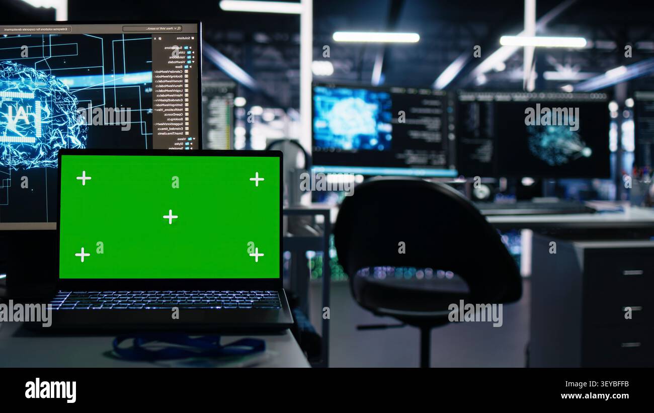 Isolated screen laptop in server room used for AI development and machine learning coding. Stock Photo