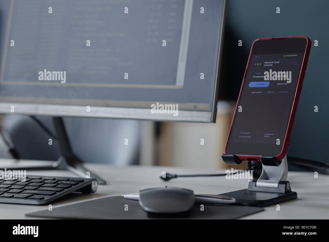 Smartphone Displaying Network Security Dashboard in Information Office Stock Photo