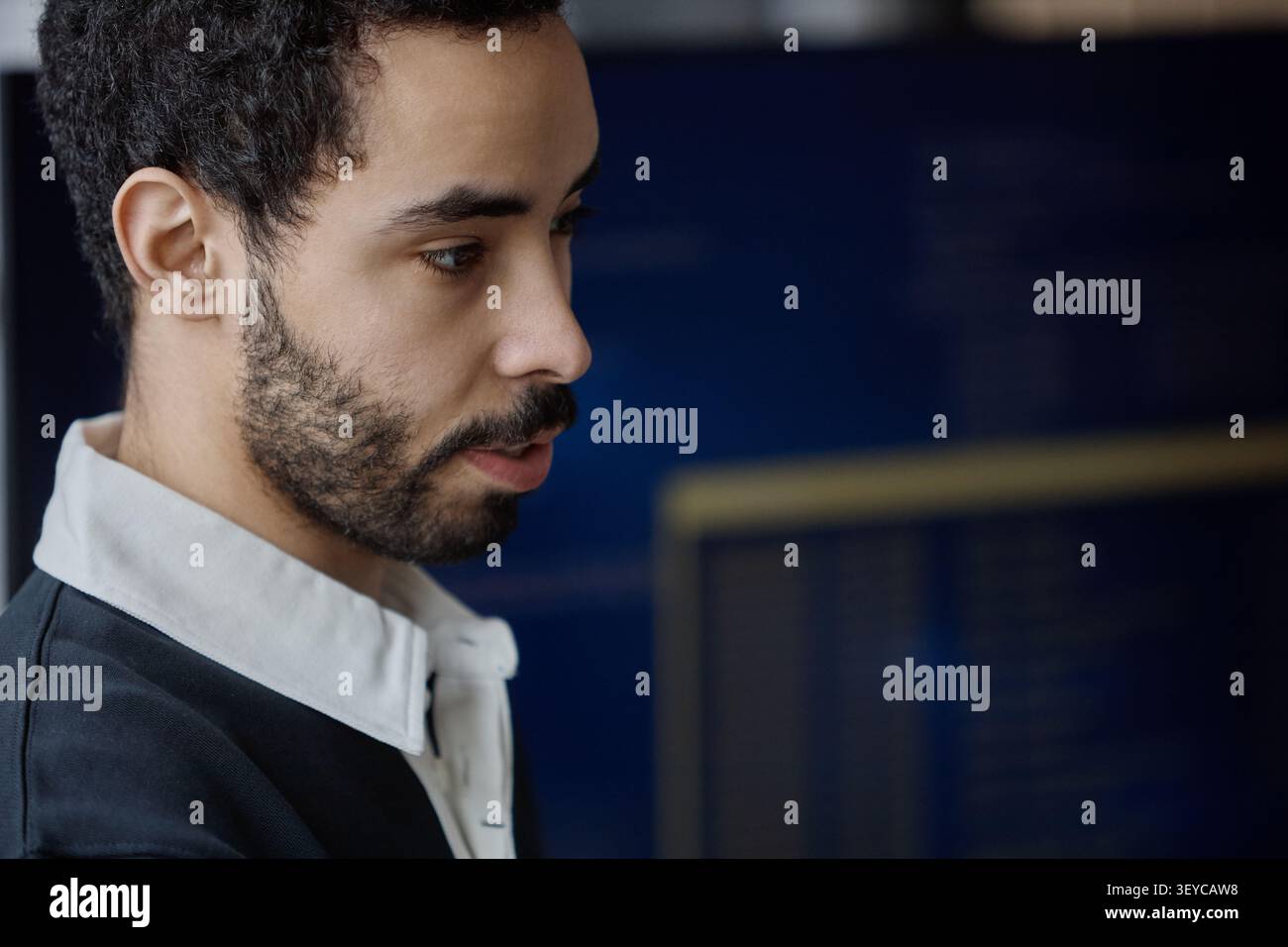 Man Working in Information Technology Office Environment Stock Photo