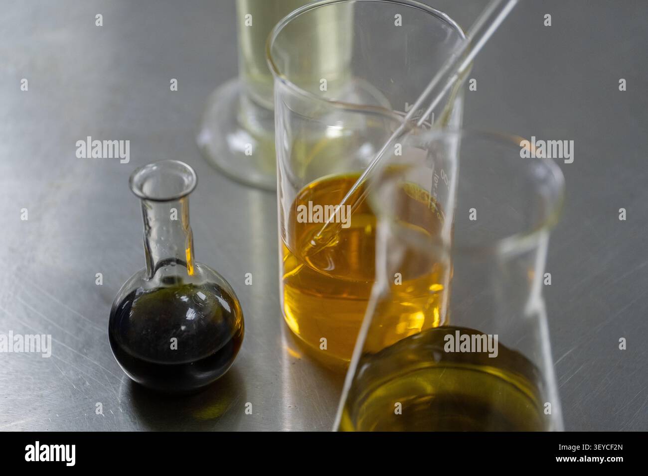 Laboratory Glassware and Pipette During Analytical Testing Stock Photo