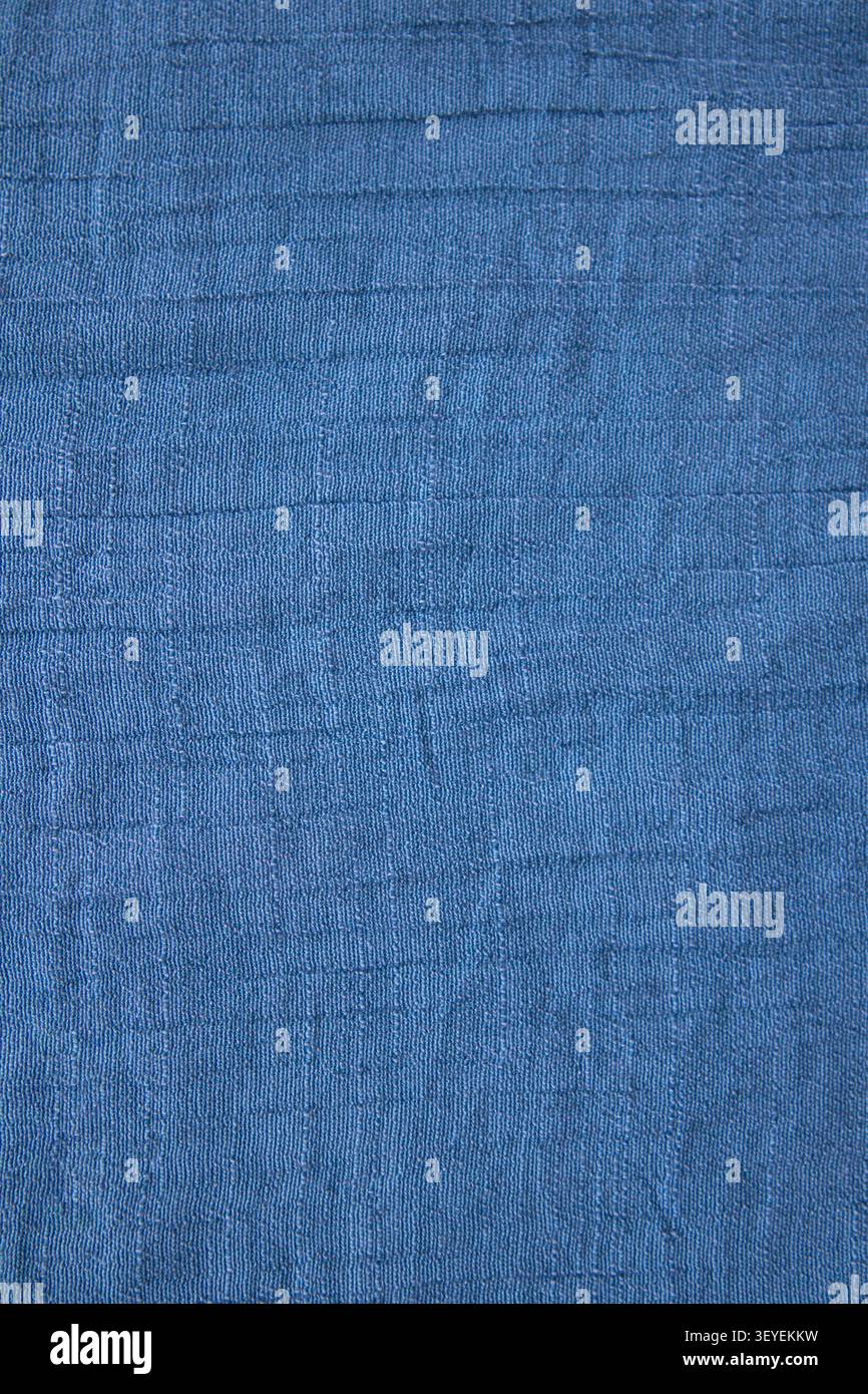 Blue textured fabric background with subtle woven pattern and soft cotton surface Stock Photo