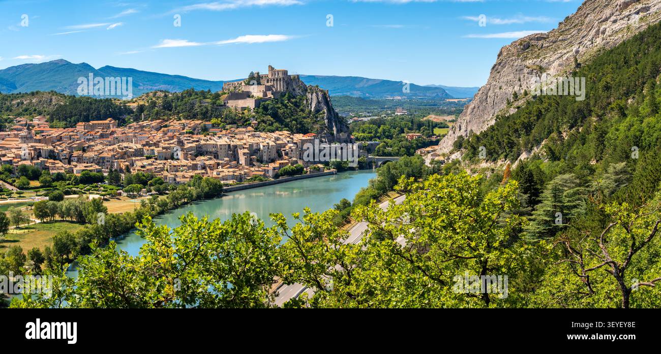 Elevated panoramic view of Sisteron and its Citadel overlooking the Durance River in summer. Historic town in Alpes-de-Haute-Provence, France Stock Photo