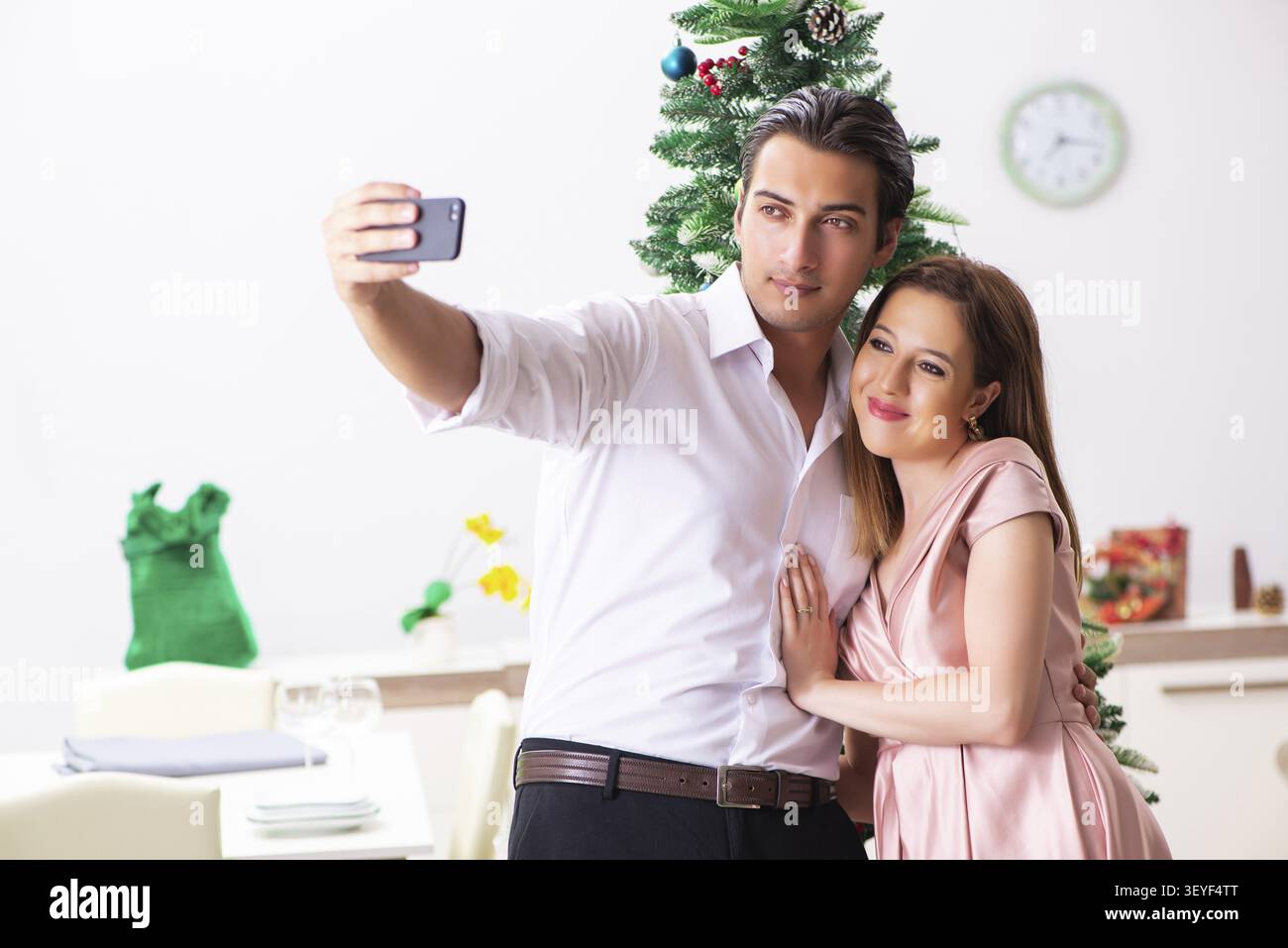 Young couple on romantic christmas date Stock Photo