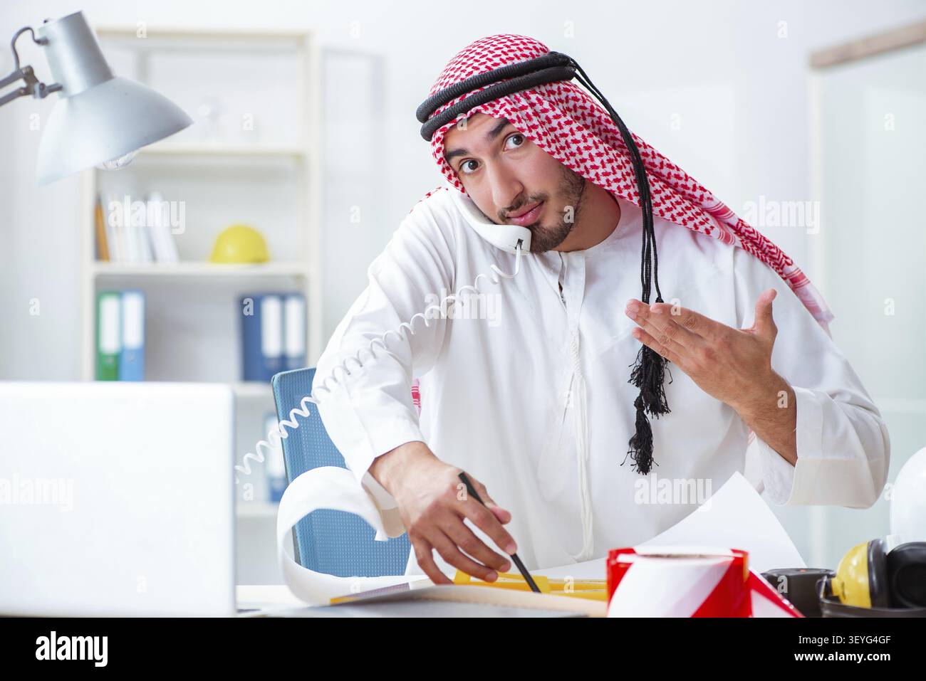 Arab engineer working on new project Stock Photo