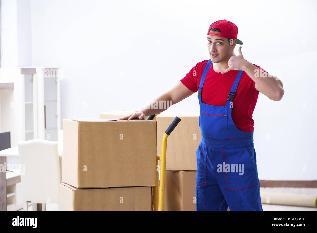 Contractor worker moving boxes during office move Stock Photo
