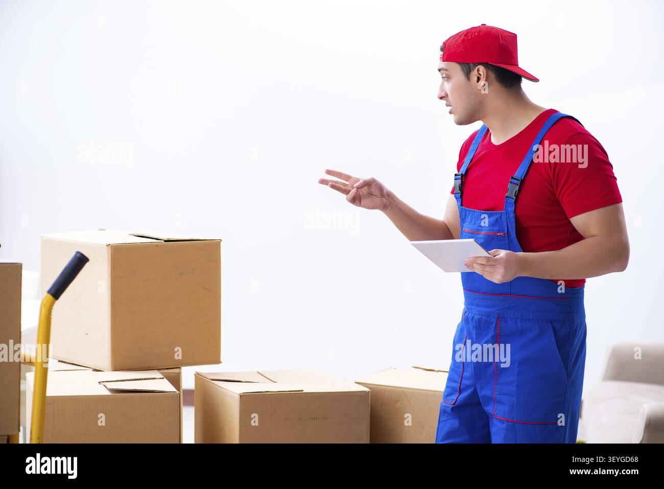 Contractor worker moving boxes during office move Stock Photo