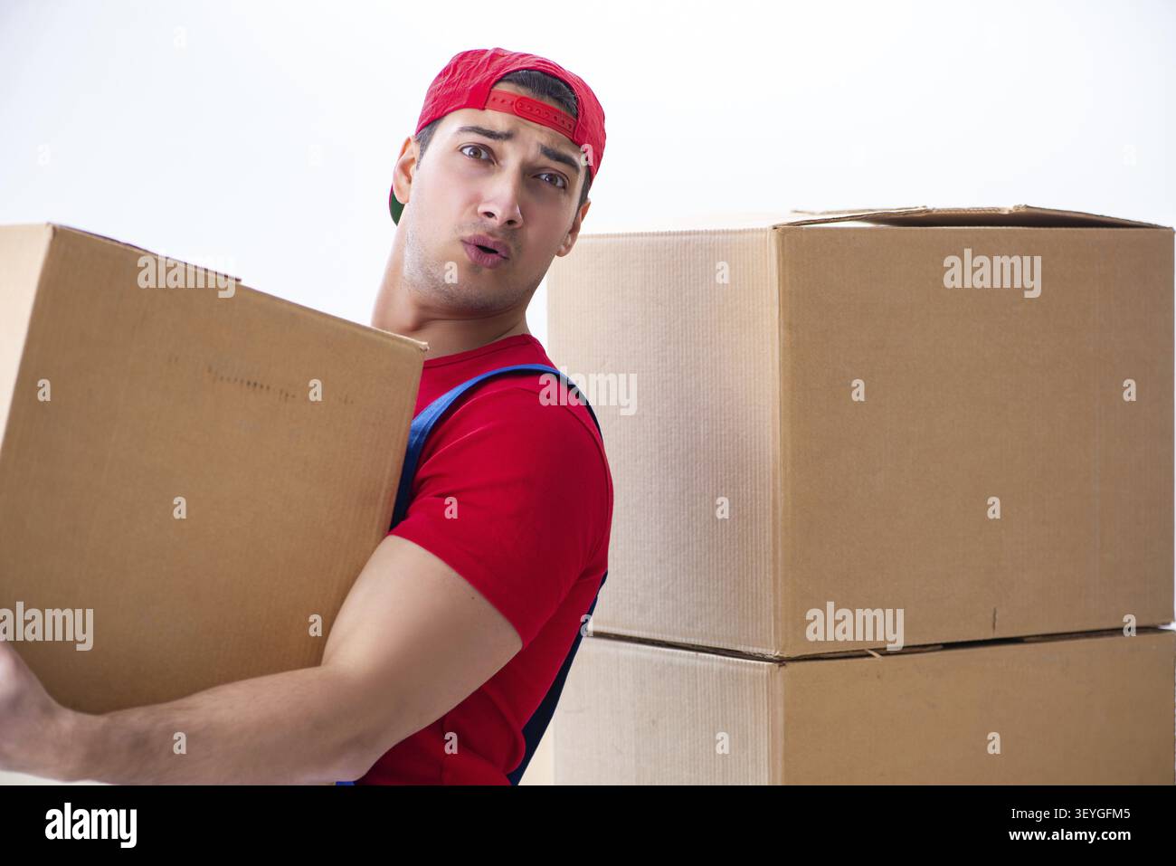 Contractor worker moving boxes during office move Stock Photo