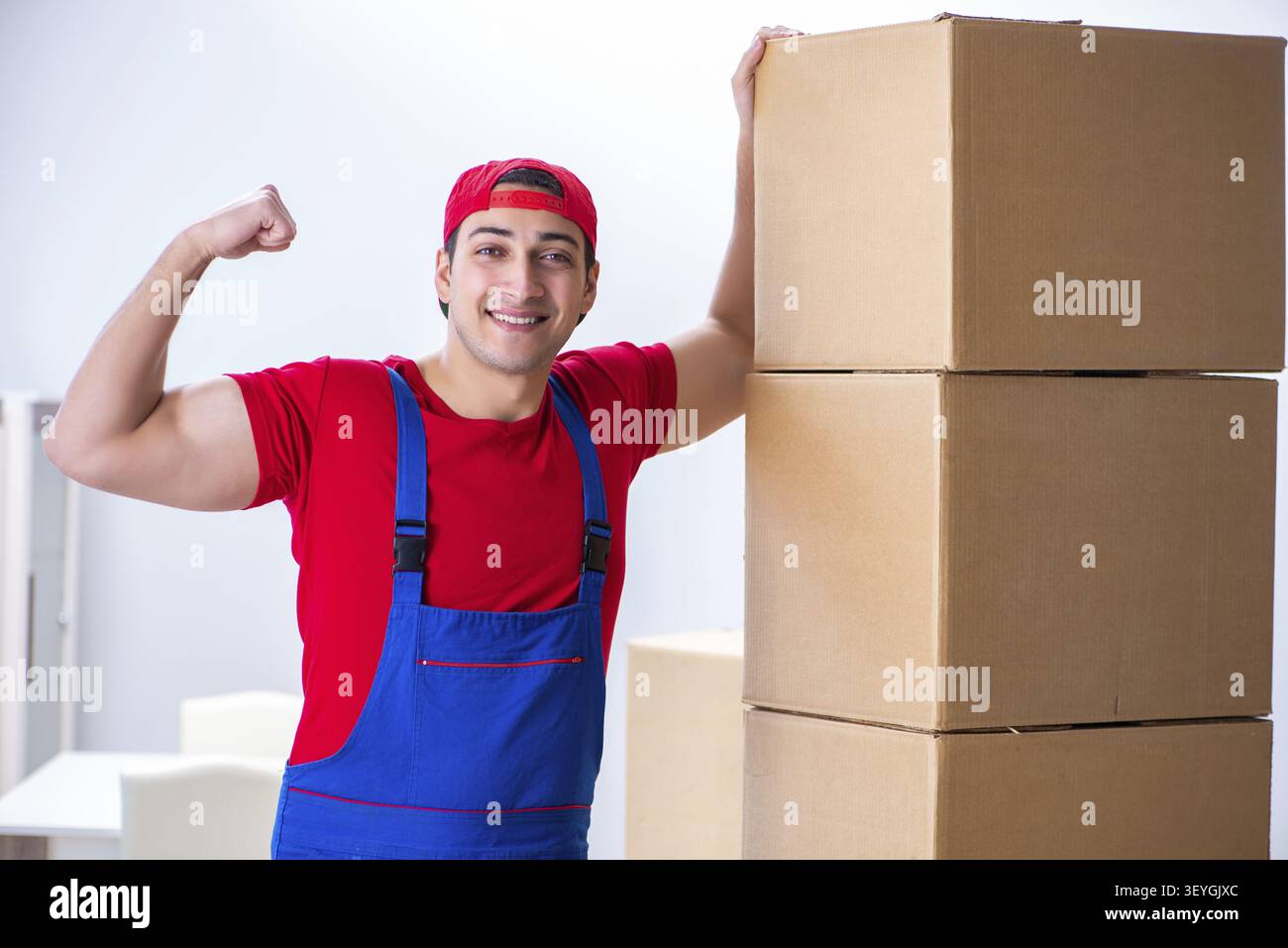 Contractor worker moving boxes during office move Stock Photo