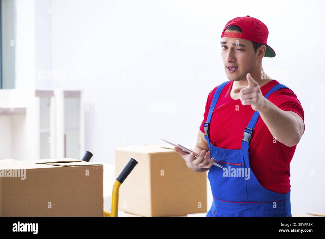 Contractor worker moving boxes during office move Stock Photo