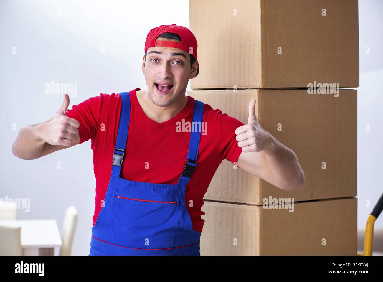 Contractor worker moving boxes during office move Stock Photo