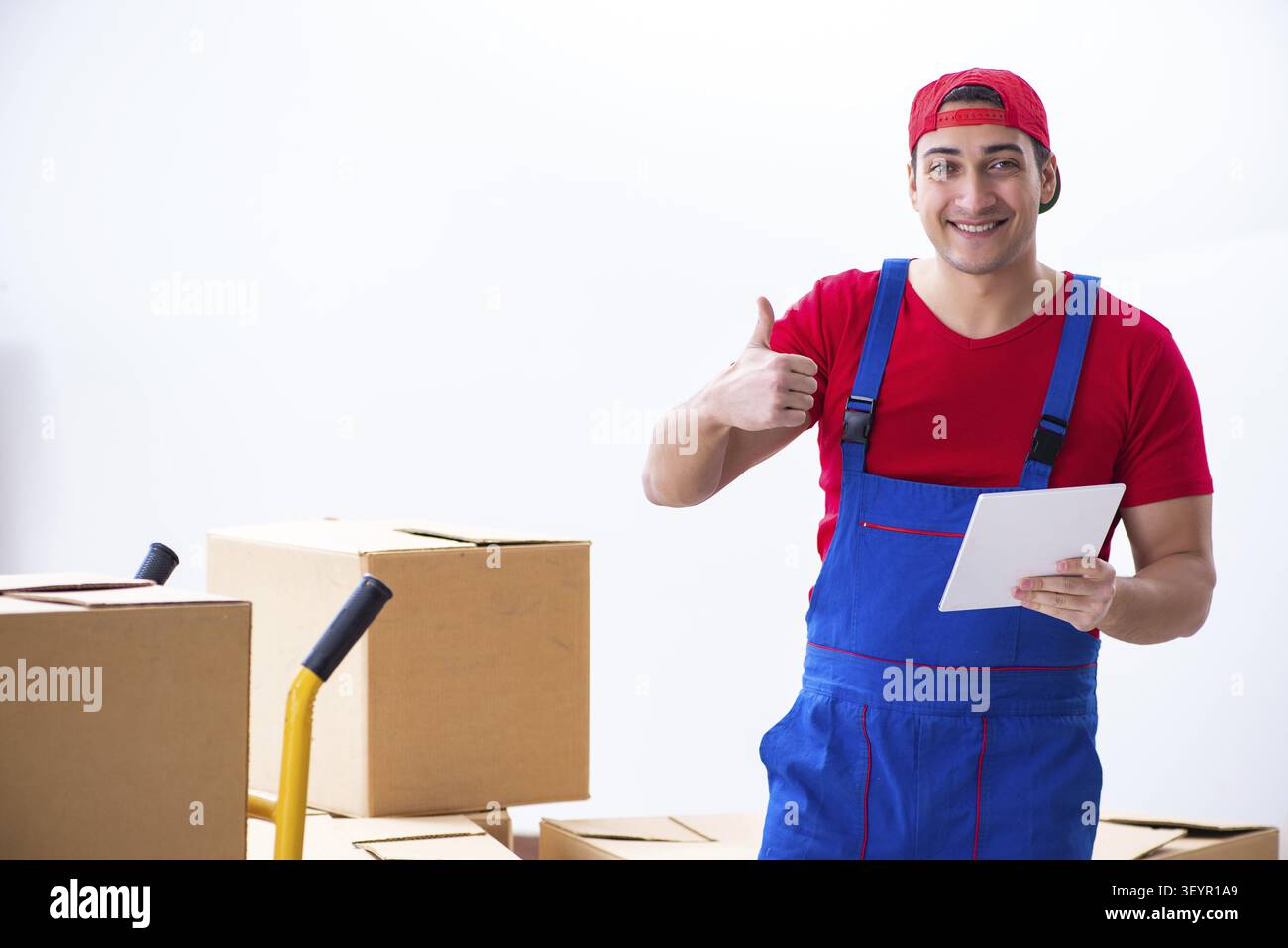 Contractor worker moving boxes during office move Stock Photo