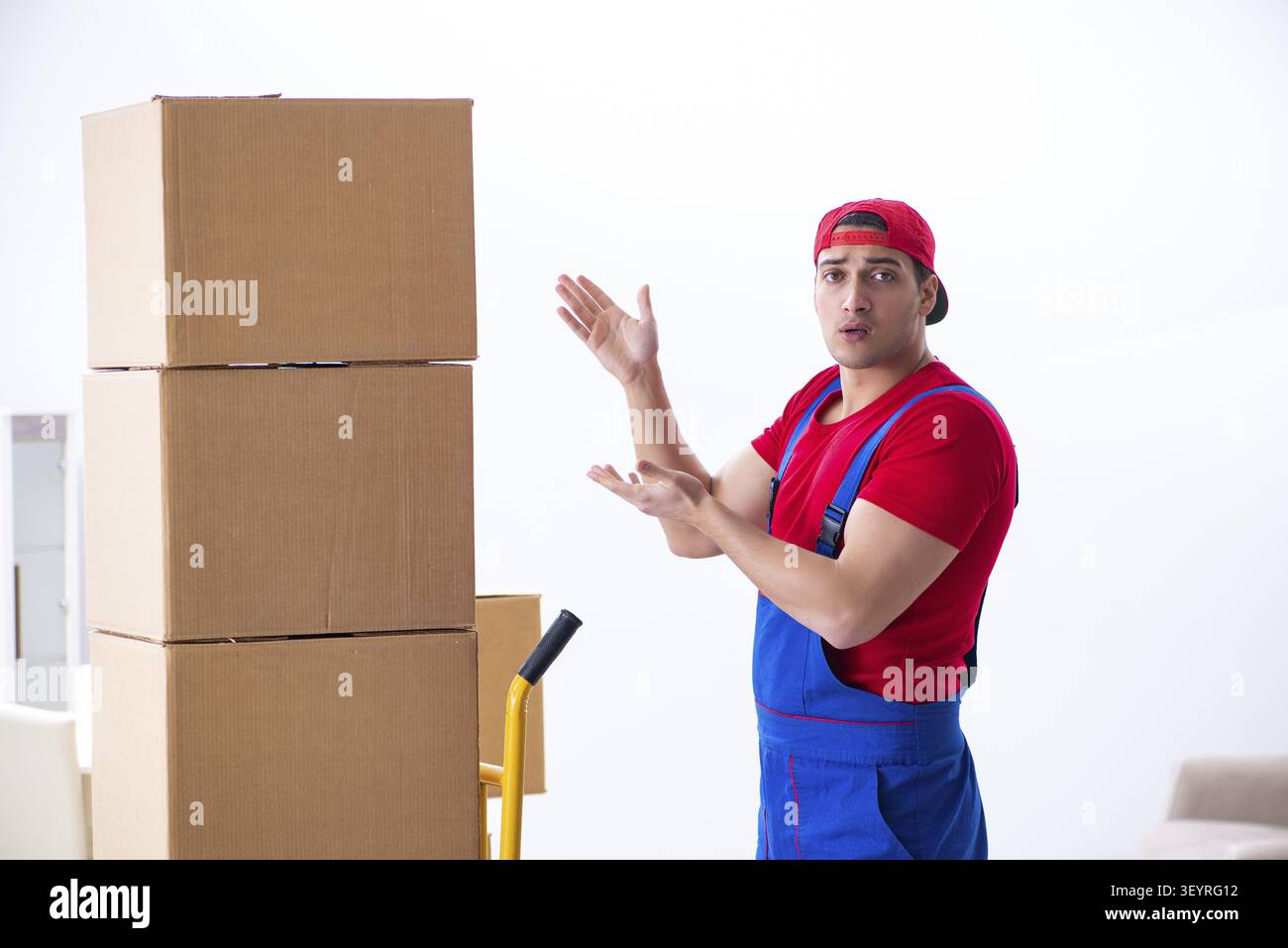 Contractor worker moving boxes during office move Stock Photo