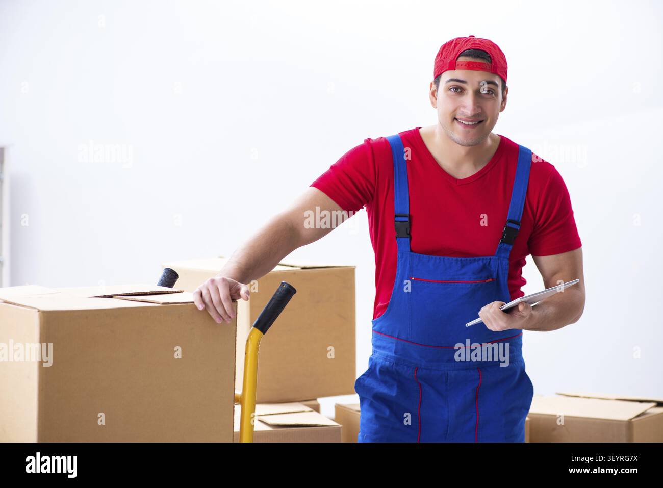 Contractor worker moving boxes during office move Stock Photo