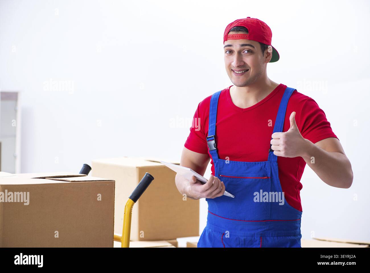 Contractor worker moving boxes during office move Stock Photo