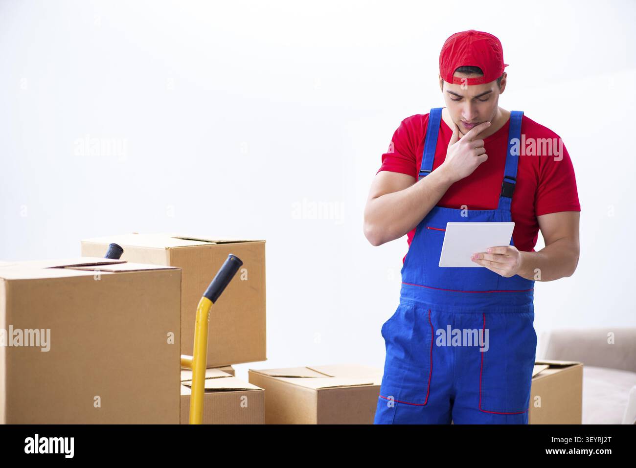 Contractor worker moving boxes during office move Stock Photo