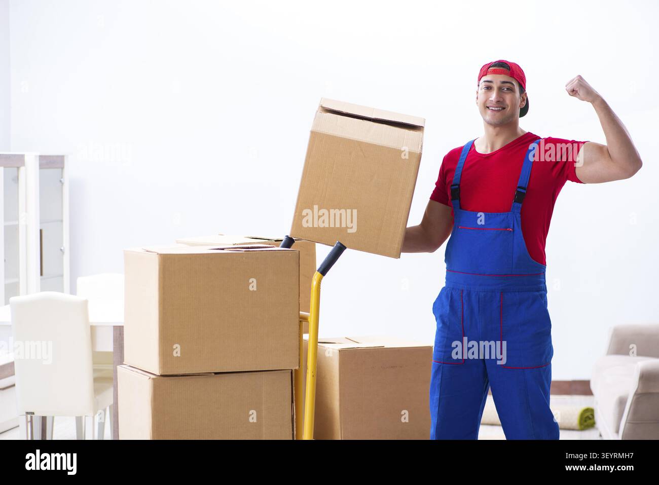 Contractor worker moving boxes during office move Stock Photo