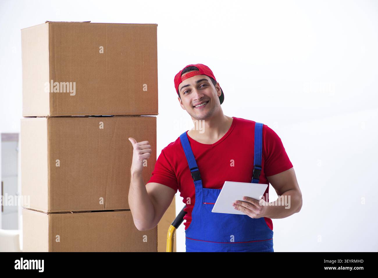 Contractor worker moving boxes during office move Stock Photo