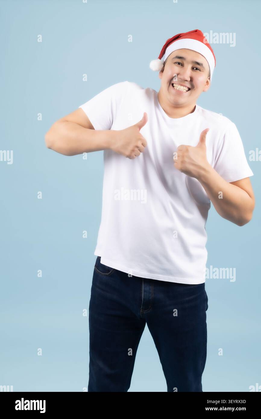 Cheerful man posing with hands on chest smiling Stock Photo