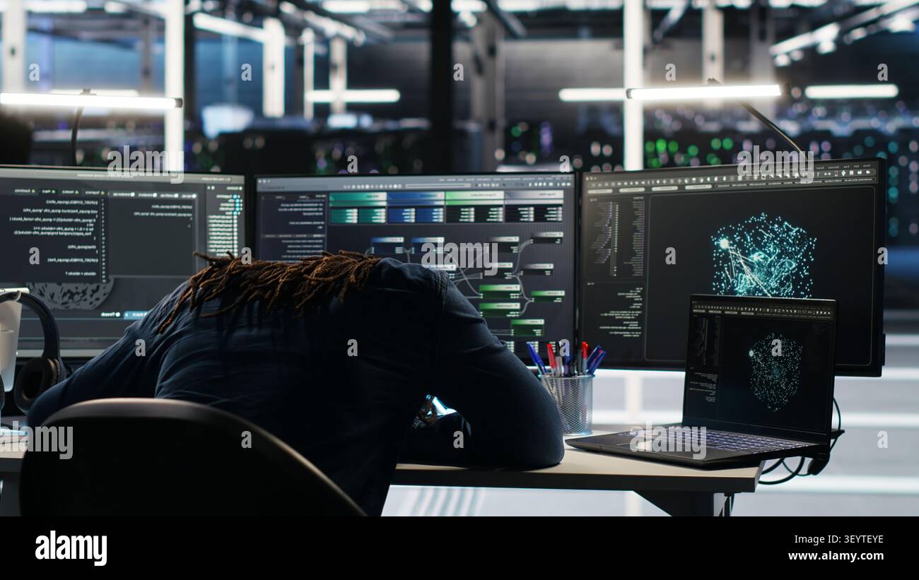 Frustrated data center worker reacts to malfunctioning node tree software and technical errors during AI analysis. Stock Photo