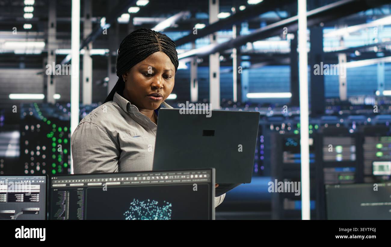 Computer scientist uses node tree AI software to analyze infrastructure and identify issues in a data center. Stock Photo