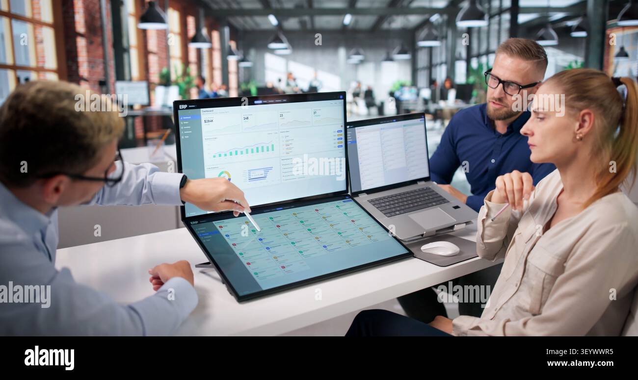 Diverse Business Team Collaborates Using Cloud-based ERP Software. Stock Photo
