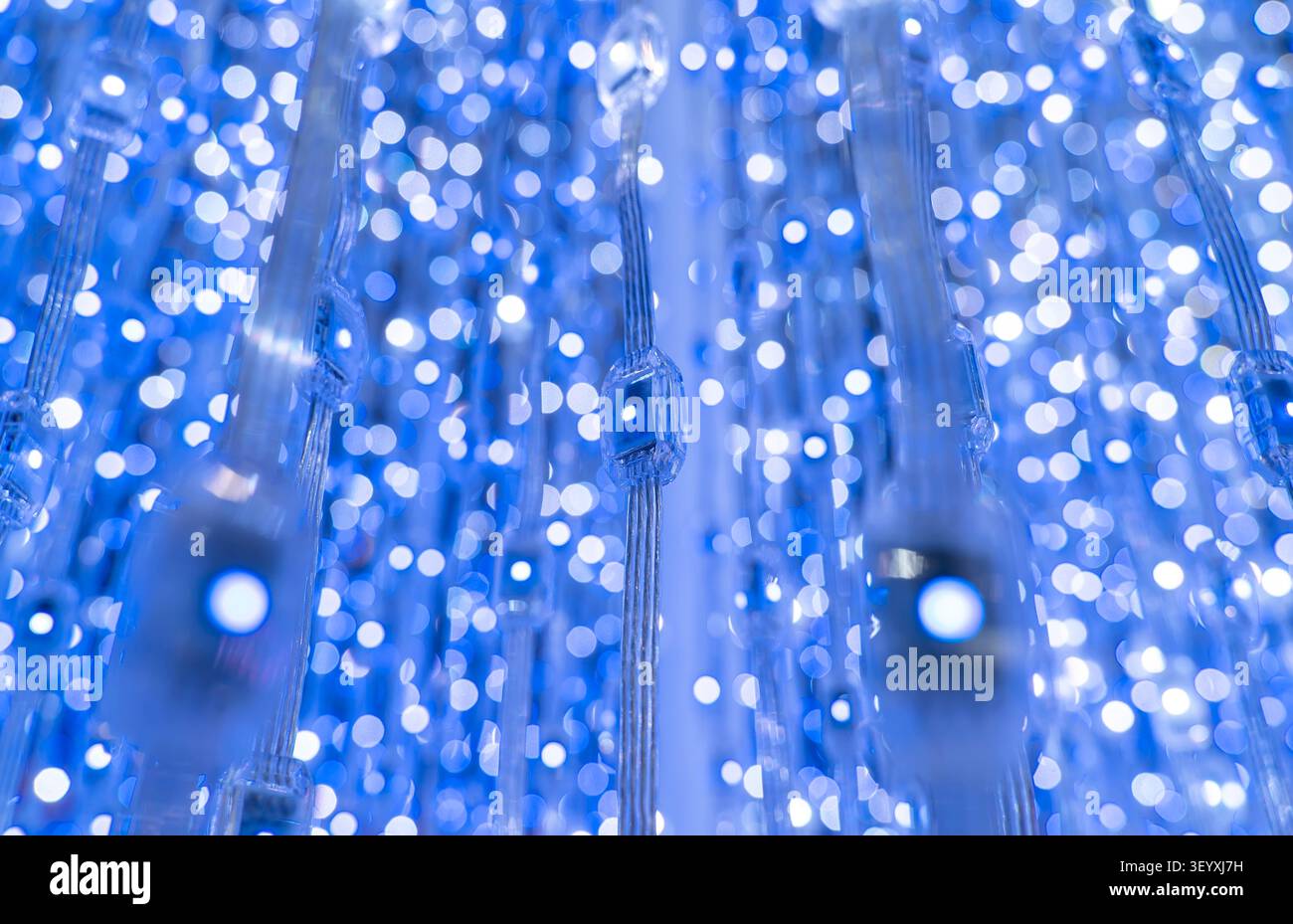 multicolored city led lights beams Stock Photo