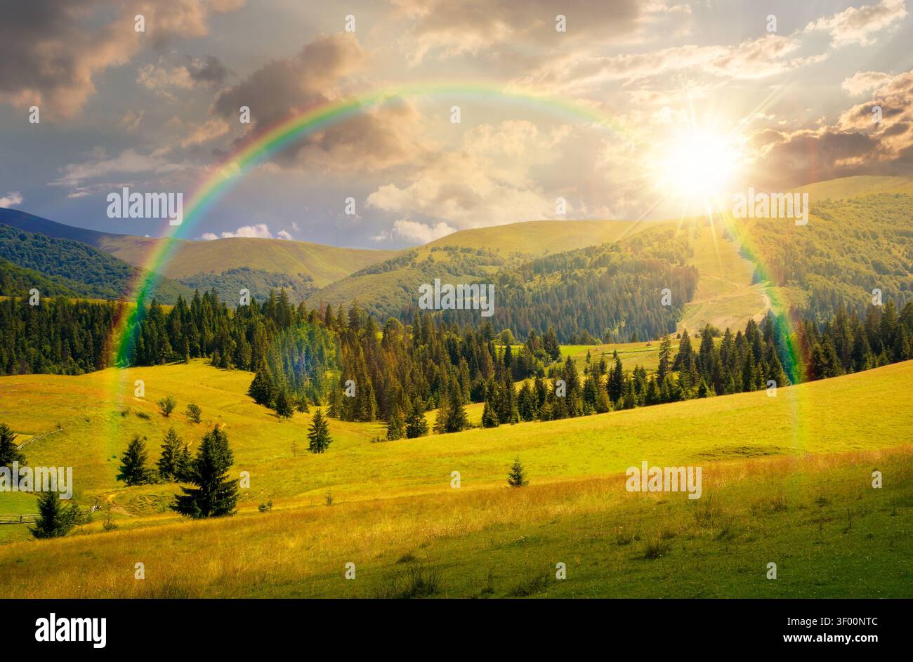 sunset over mountainous countryside landscape in summer. view of green rural scenery with grassy pastures and rolling forested hills. wonderful mounta Stock Photo