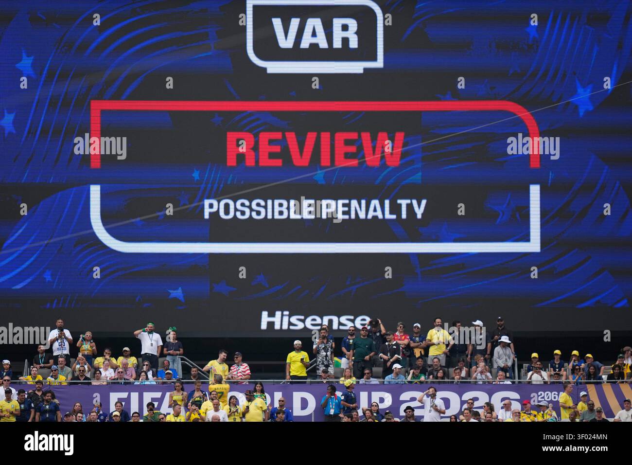 A screen displays a possible penalty during a review at the World Cup ...
