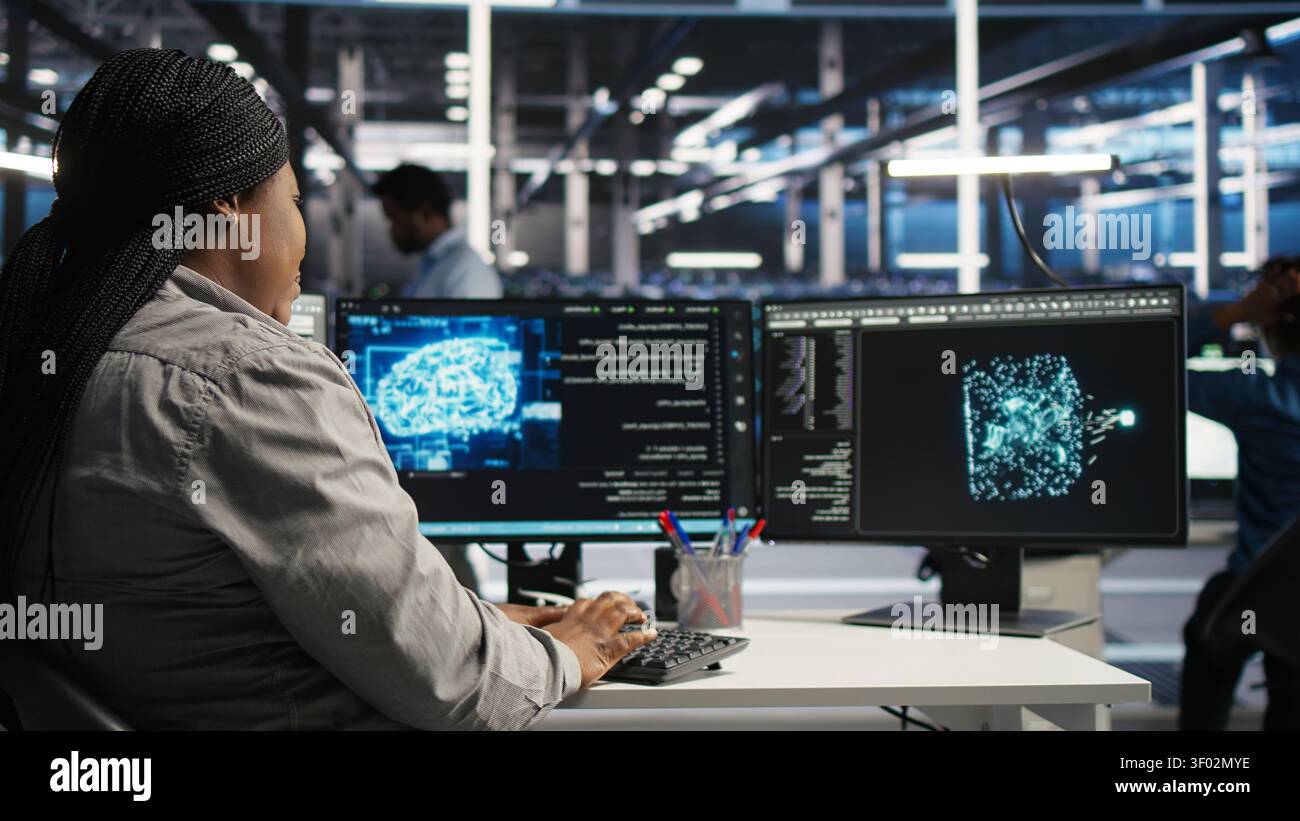 Server facility staff member rolling out AI solutions optimizing equipment. Server environment software engineer applying AI technology minimizing infrastructure downtime. Stock Photo