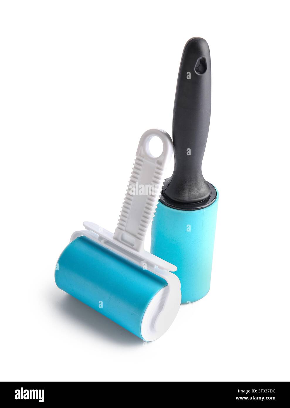 Different lint rollers on white background Stock Photo