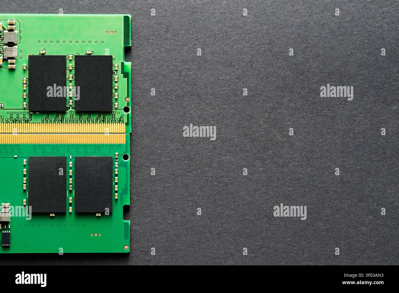 RAM Component Entering Frame on Black Textured Paper Stock Photo