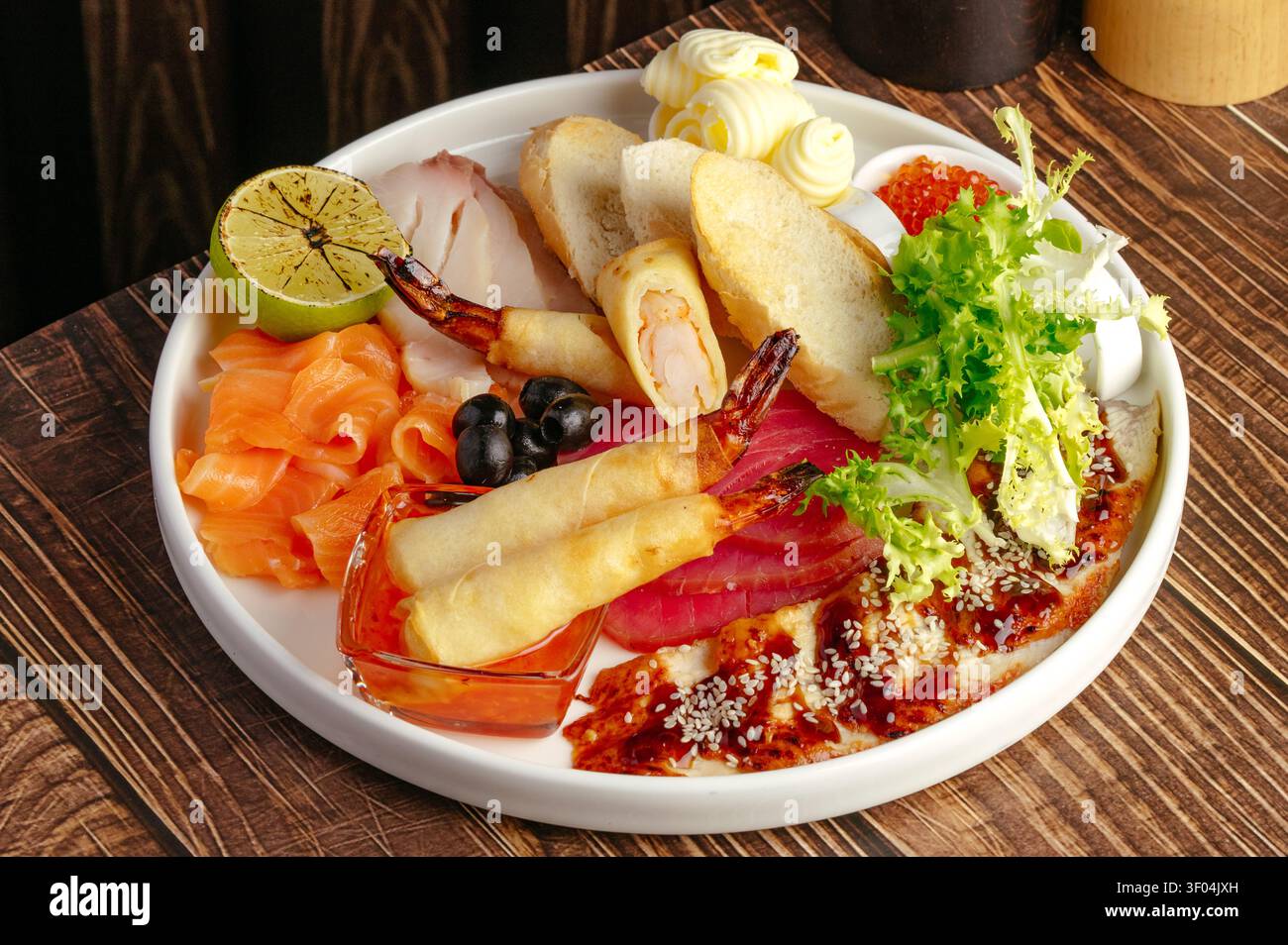 Gourmet assorted seafood appetizer platter with fish Stock Photo