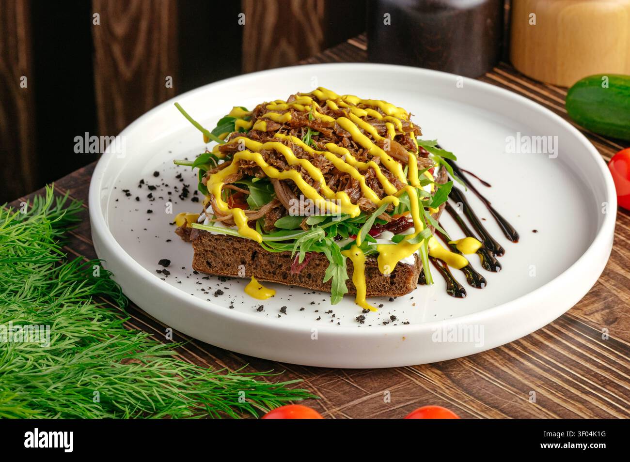 Gourmet pulled meat toast with mustard and arugula Stock Photo